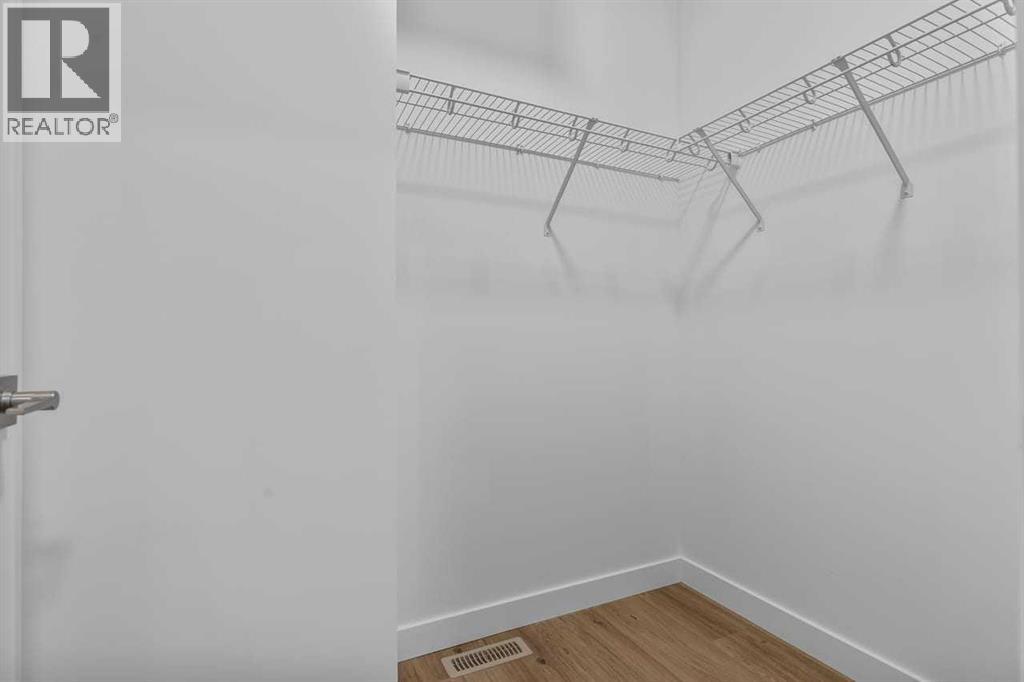 90 Heritage Circle, Cochrane, Alberta  T4C 3G9 - Photo 23 - A2283545