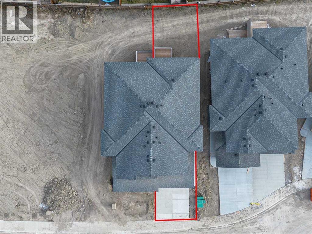 90 Heritage Circle, Cochrane, Alberta  T4C 3G9 - Photo 45 - A2283545