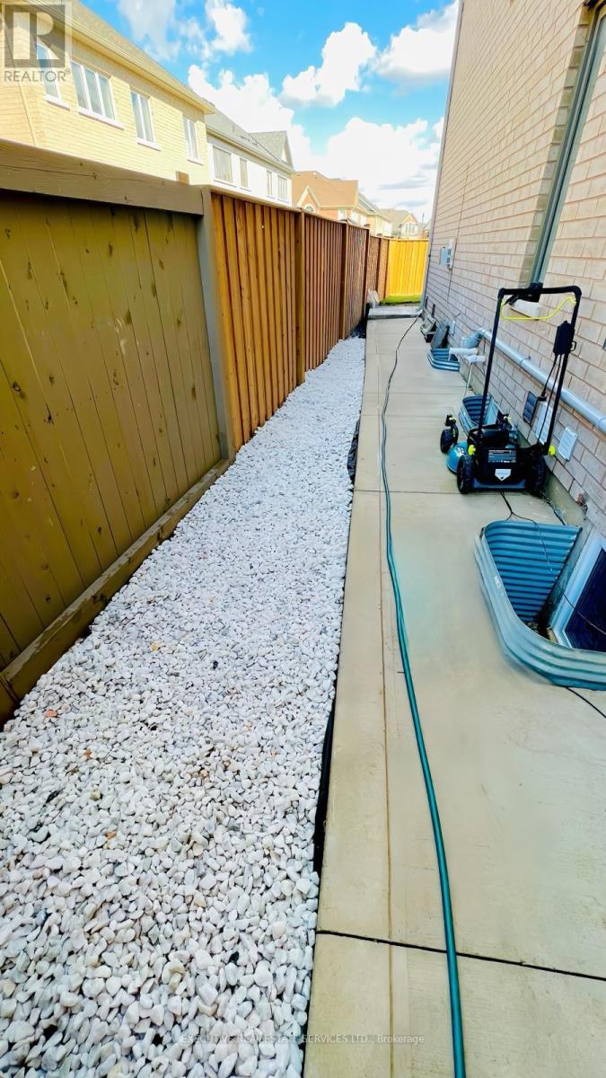 69 Dolobram Trail, Brampton, Ontario  L7A 4Y4 - Photo 2 - W12788210