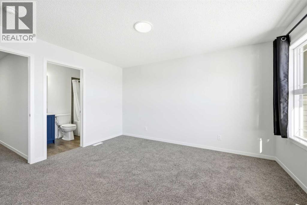 185 Edith Green Nw, Calgary, Alberta  T3R 2H2 - Photo 21 - A2281548