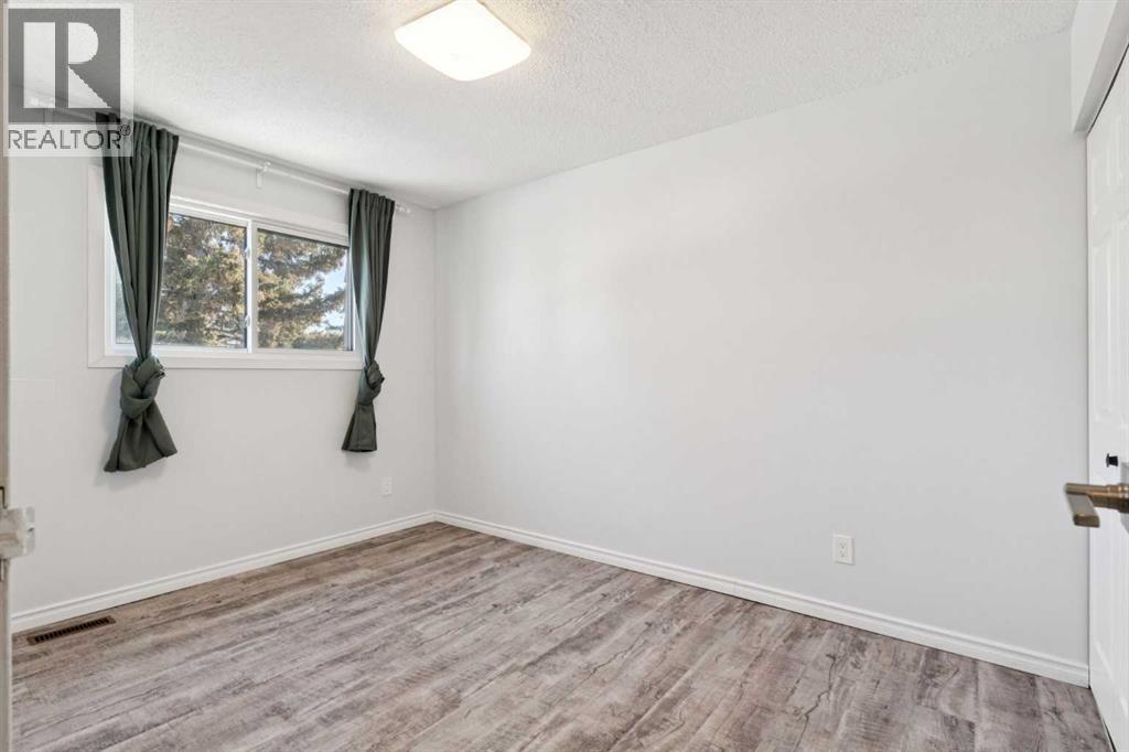 10618 Braeside Drive Sw, Calgary, Alberta  T2W 1B9 - Photo 18 - A2281567