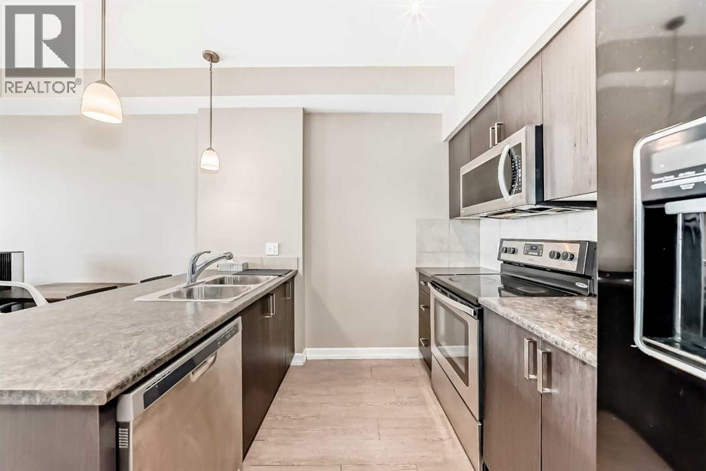 311, 117 Copperpond Common Se, Calgary, Alberta  T2Z 5E6 - Photo 10 - A2273026