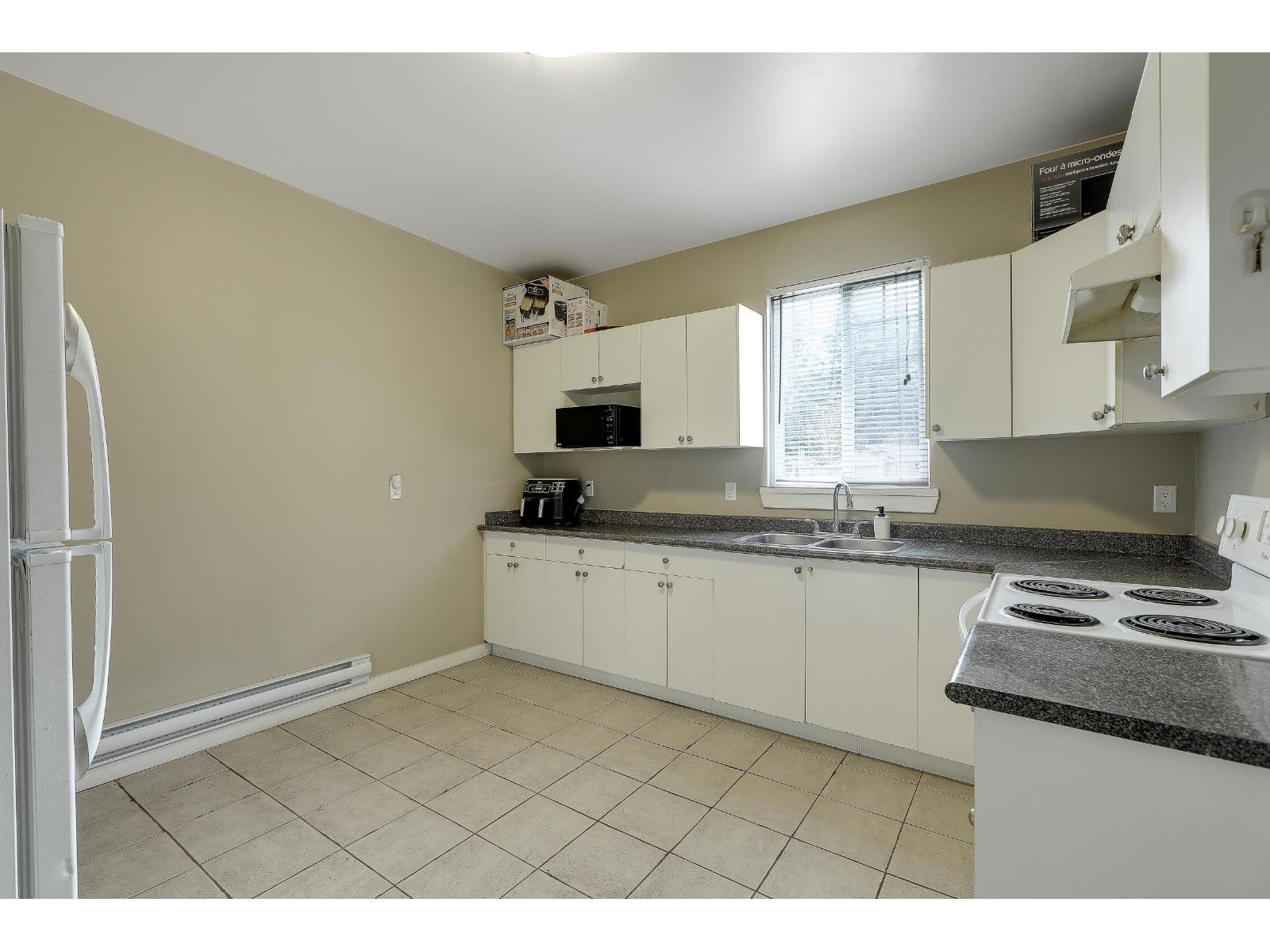 7028 Malvern Place, Surrey, British Columbia  V3W 6N2 - Photo 34 - R3089654