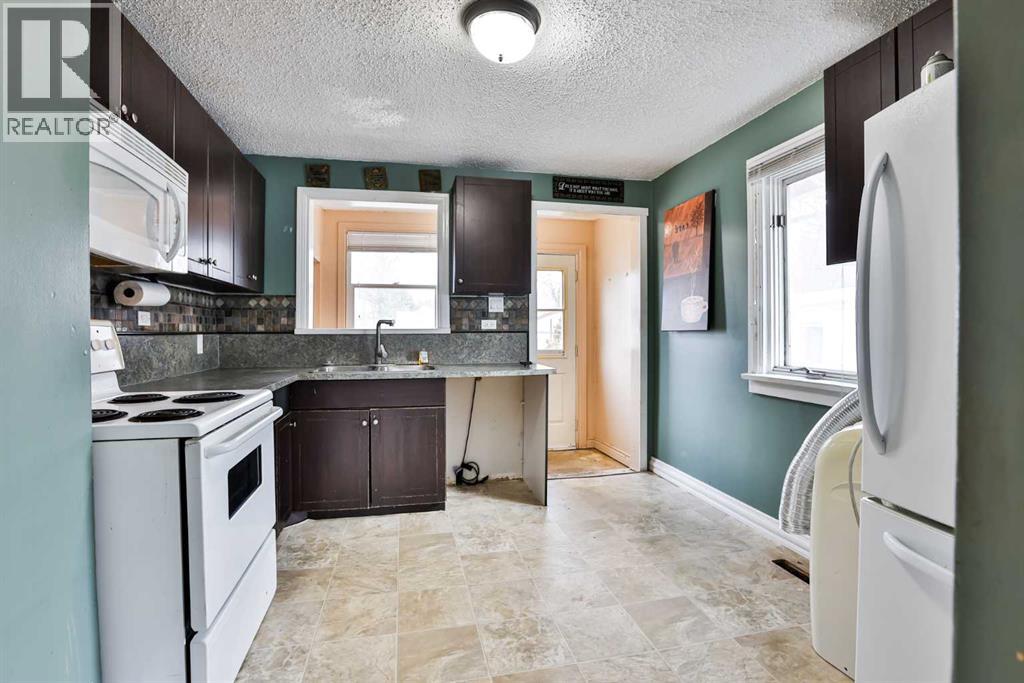 911 8 Street S, Lethbridge, Alberta  T1J 2K7 - Photo 6 - A2280670