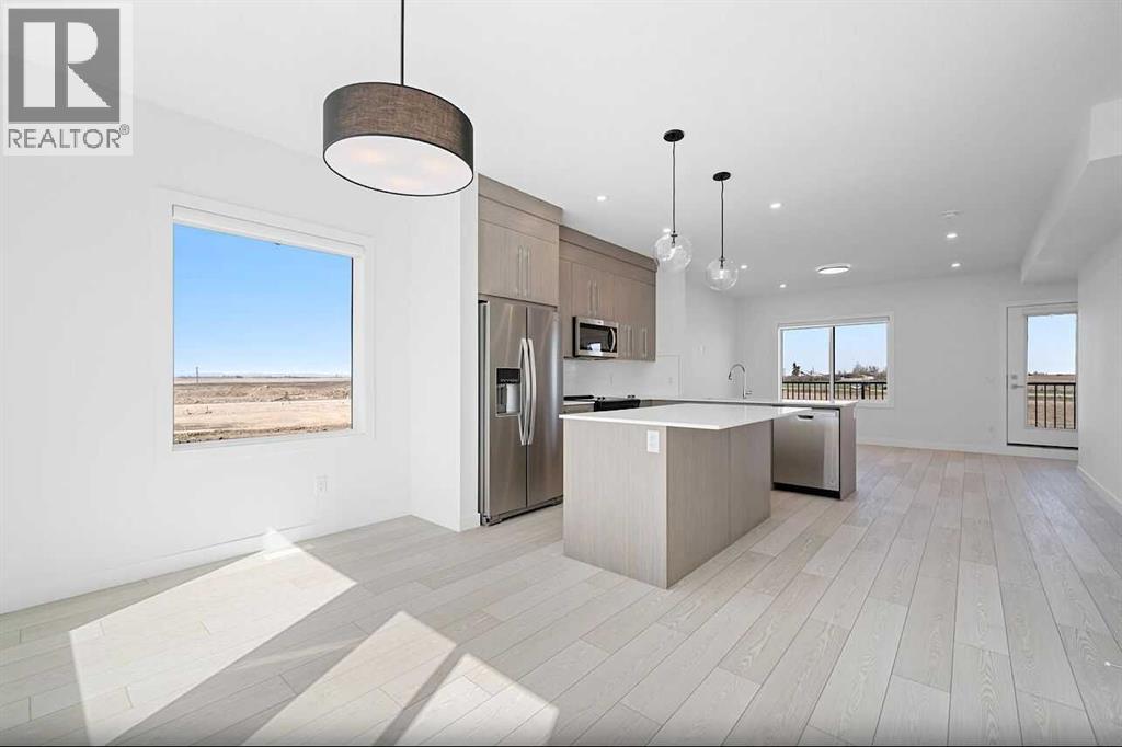 703, 280 Chelsea Road, Chestermere, Alberta  T1X 2X9 - Photo 2 - A2286437