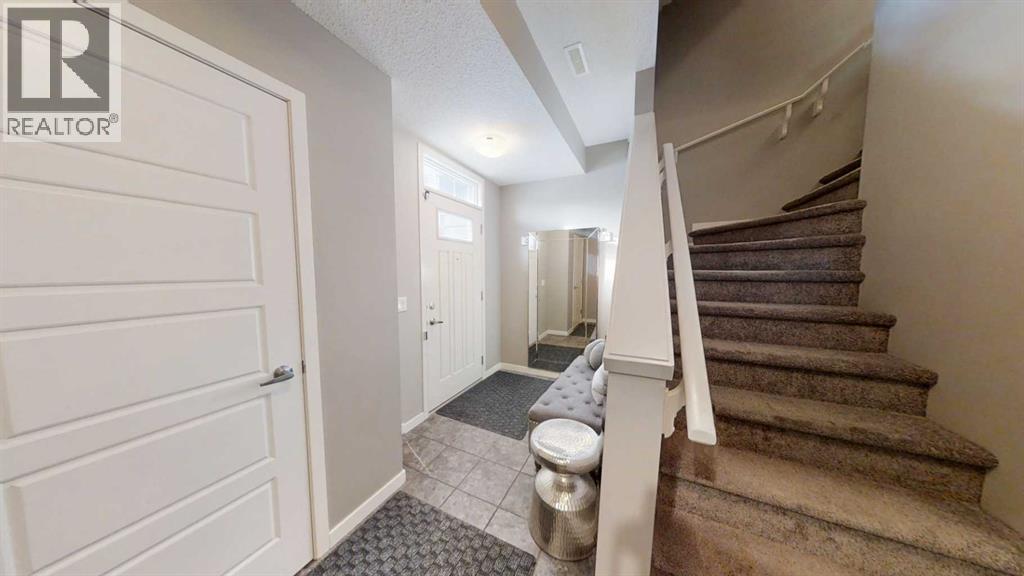 165 Panatella Square Nw, Calgary, Alberta  T3K 0Z4 - Photo 4 - A2275320