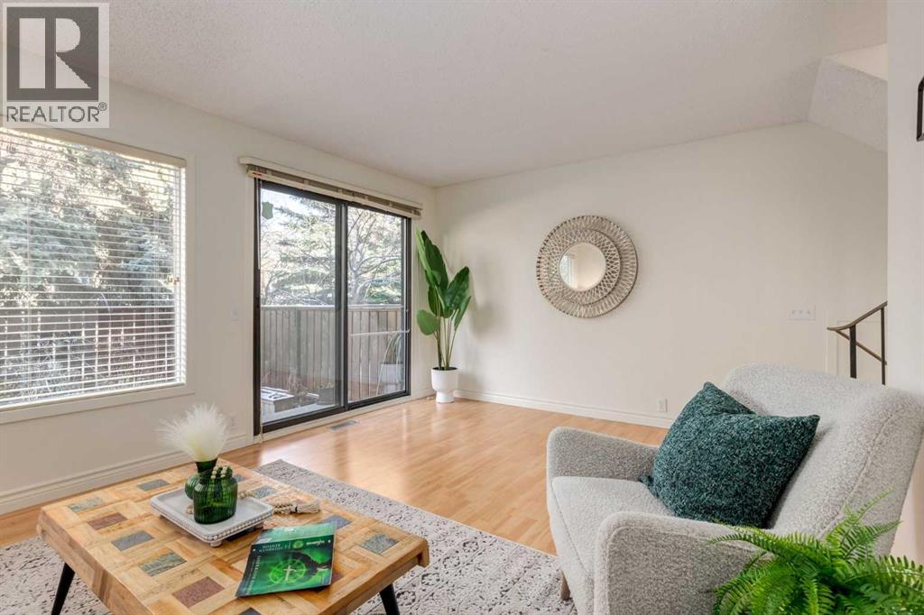 116 Point Drive Nw, Calgary, Alberta T3B 5B3 - Photo 6 - A2271488