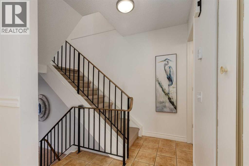 116 Point Drive Nw, Calgary, Alberta T3B 5B3 - Photo 16 - A2271488