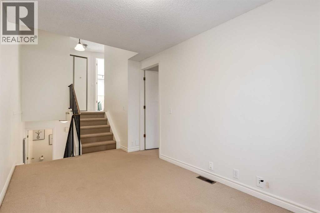 116 Point Drive Nw, Calgary, Alberta T3B 5B3 - Photo 18 - A2271488