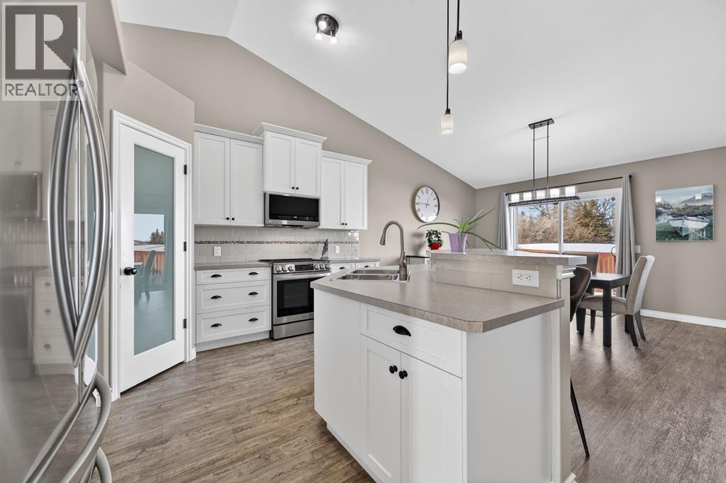 26 Mackenzie Way, Carstairs, Alberta  T0M 0N0 - Photo 7 - A2281360