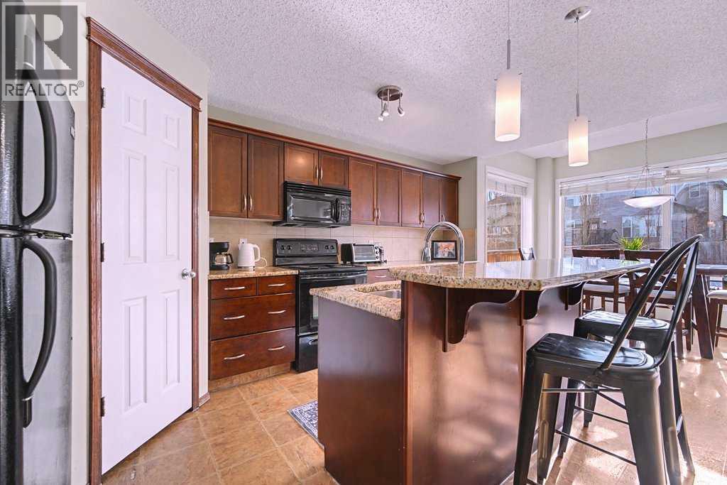 154 New Brighton Lane Se, Calgary, Alberta T2E 0E2 - Photo 5 - A2284696