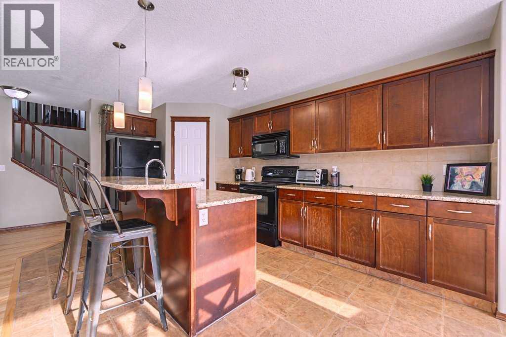 154 New Brighton Lane Se, Calgary, Alberta T2E 0E2 - Photo 8 - A2284696