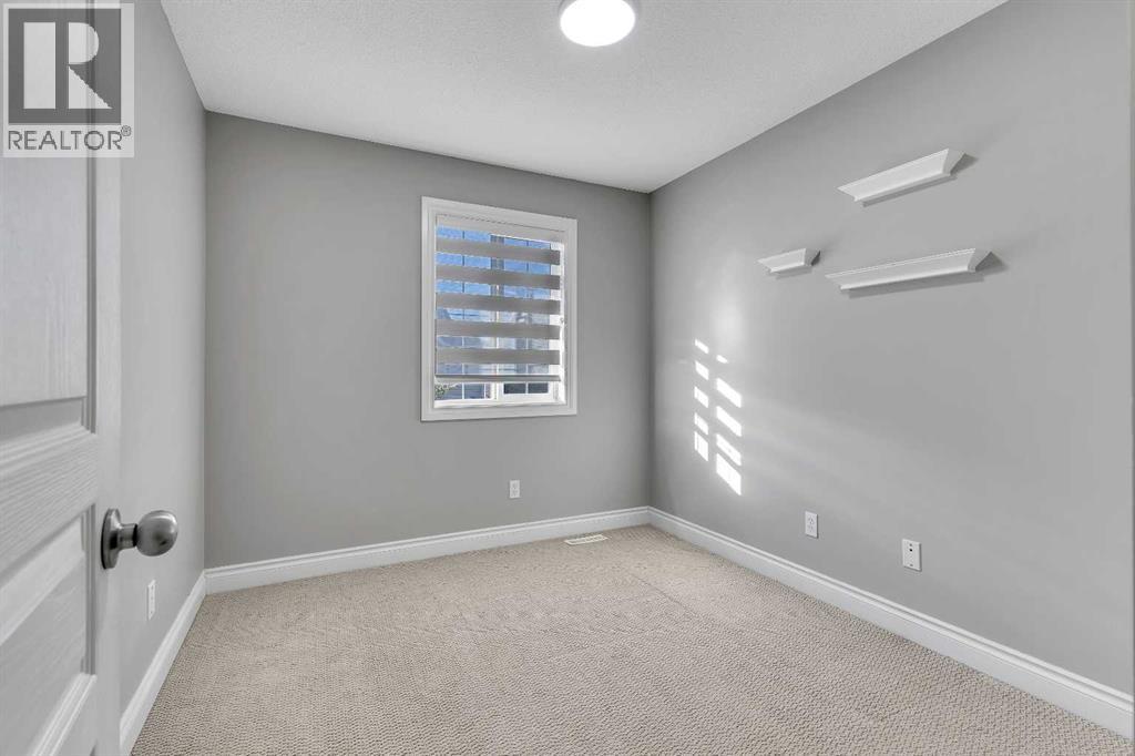 69 Cougar Ridge Mews Sw, Calgary, Alberta T3H 5P3 - Photo 23 - A2286177