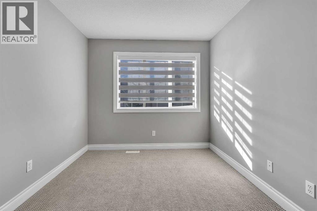 69 Cougar Ridge Mews Sw, Calgary, Alberta T3H 5P3 - Photo 25 - A2286177