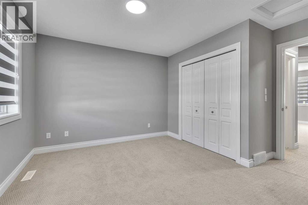 69 Cougar Ridge Mews Sw, Calgary, Alberta T3H 5P3 - Photo 30 - A2286177