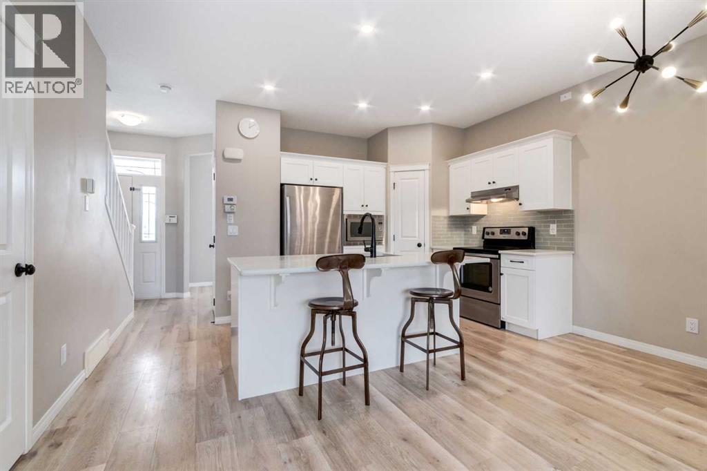 730 Belmont Drive Sw, Calgary, Alberta  T2X 4H3 - Photo 4 - A2286204