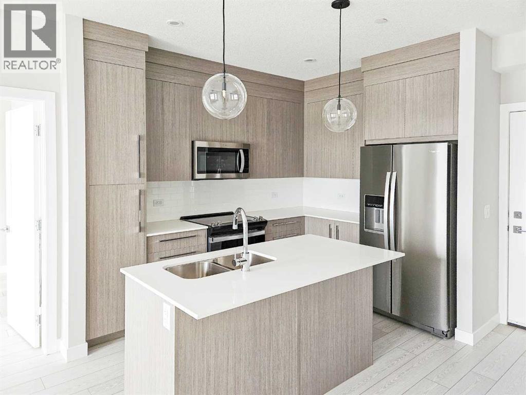 2413, 111 Wolf Creek Drive Se, Calgary, Alberta  T2X 5X2 - Photo 2 - A2285535