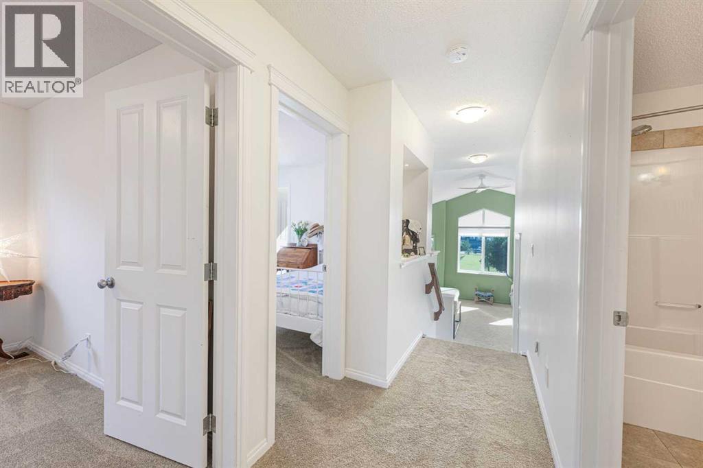 204 Paint Horse Drive, Cochrane, Alberta  T4C 0X1 - Photo 25 - A2286049