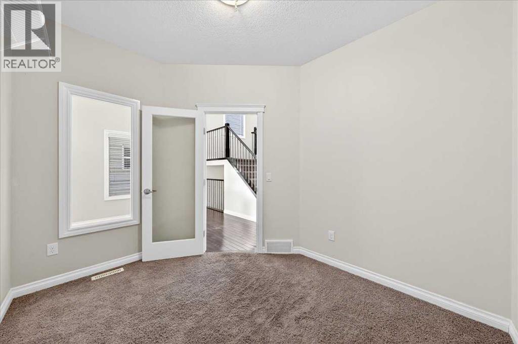 194 Sherwood Mount Nw, Calgary, Alberta  T3R 0G5 - Photo 5 - A2285445