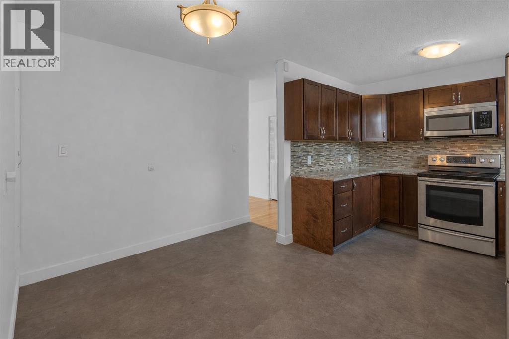 6312 Thorncliffe Drive Nw, Calgary, Alberta  T2K 3A7 - Photo 8 - A2278293