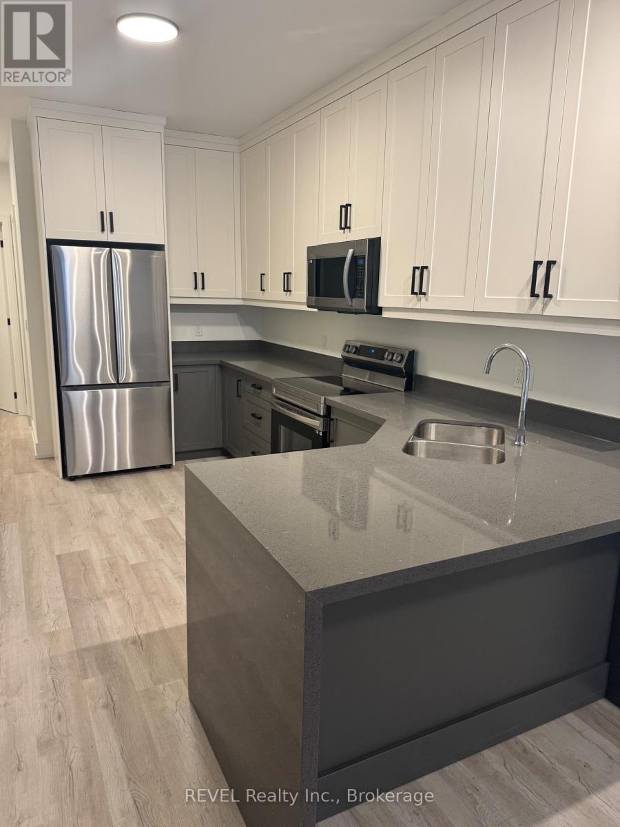 210 - 300b Fourth Avenue, St. Catharines, Ontario L2S 0E6 - Photo 8 - X12789800