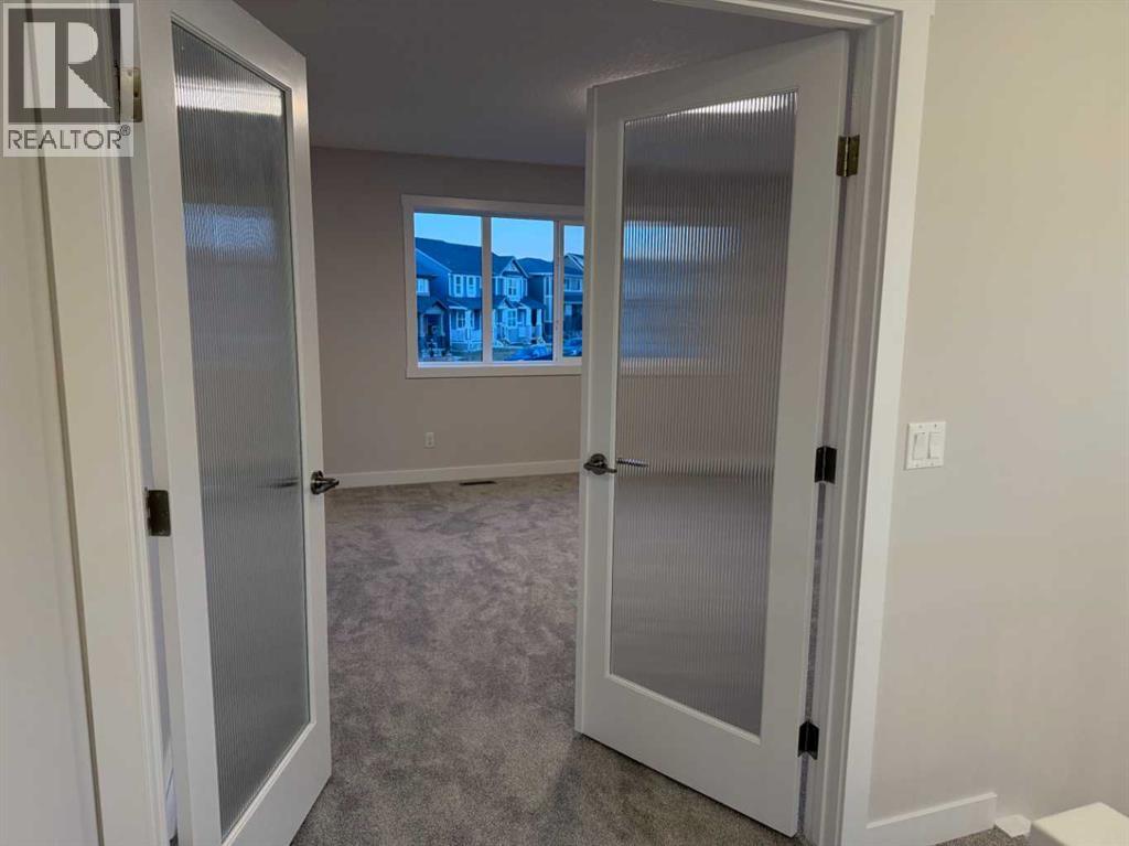 51 Sunrise Heath, Cochrane, Alberta  T4C 3C5 - Photo 35 - A2256885