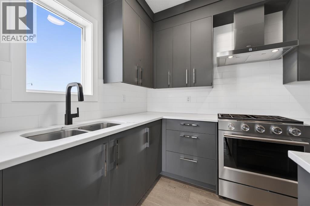 709 Dawson Place, Chestermere, Alberta  T1X 1Z7 - Photo 4 - A2286486