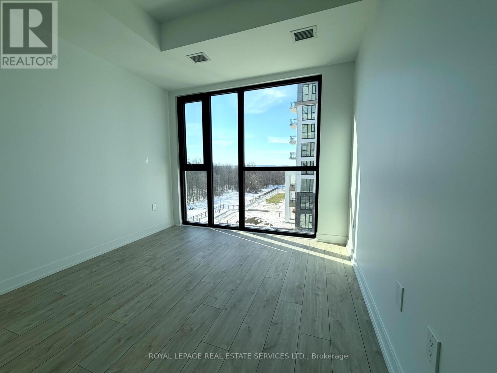 404 - 750 Whitlock Avenue, Milton, Ontario  L9E 2B4 - Photo 9 - W12790068