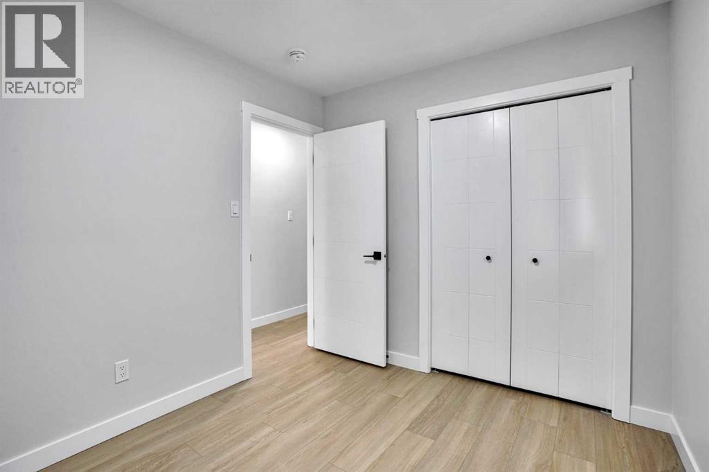 1306 Berkley Drive Nw, Calgary, Alberta  T3K 1S9 - Photo 17 - A2286533