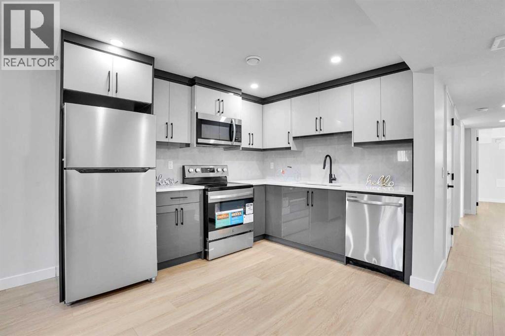 1306 Berkley Drive Nw, Calgary, Alberta  T3K 1S9 - Photo 19 - A2286533