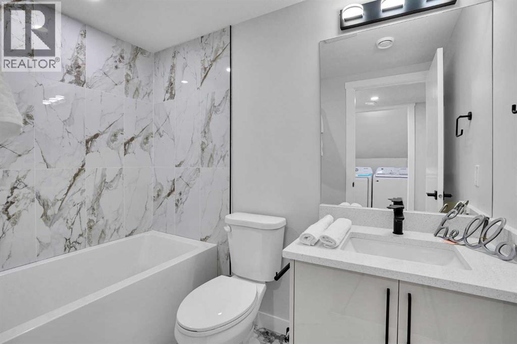 1306 Berkley Drive Nw, Calgary, Alberta  T3K 1S9 - Photo 25 - A2286533