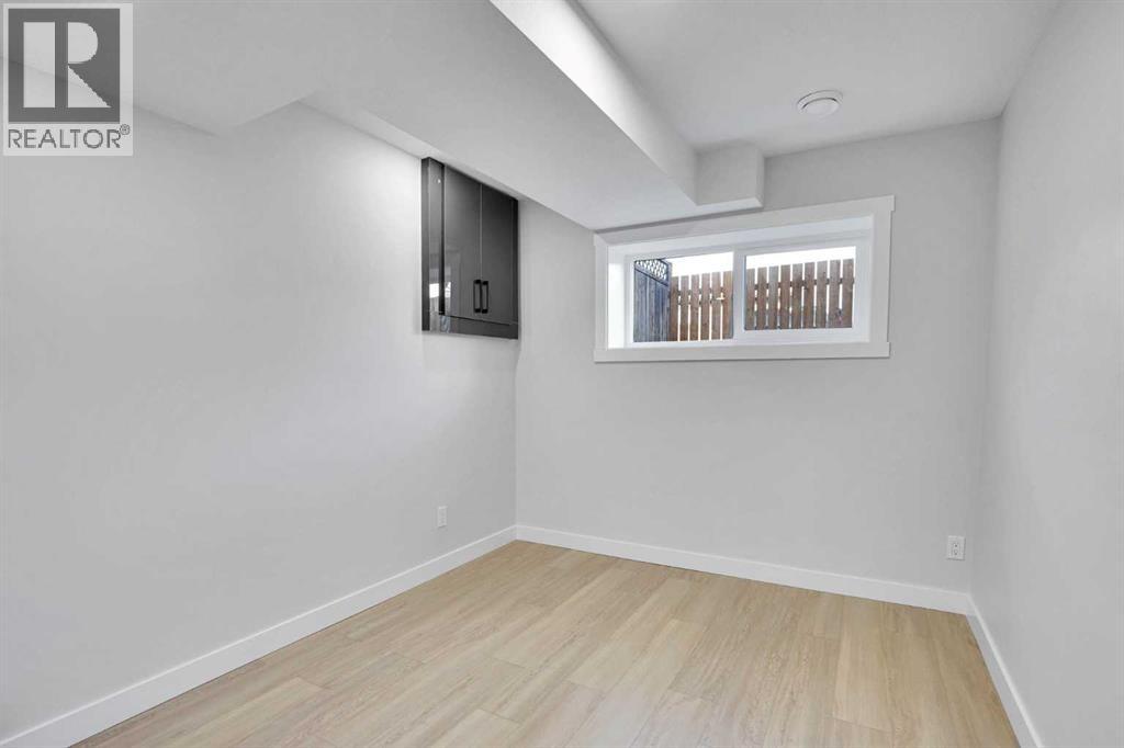 1306 Berkley Drive Nw, Calgary, Alberta  T3K 1S9 - Photo 26 - A2286533