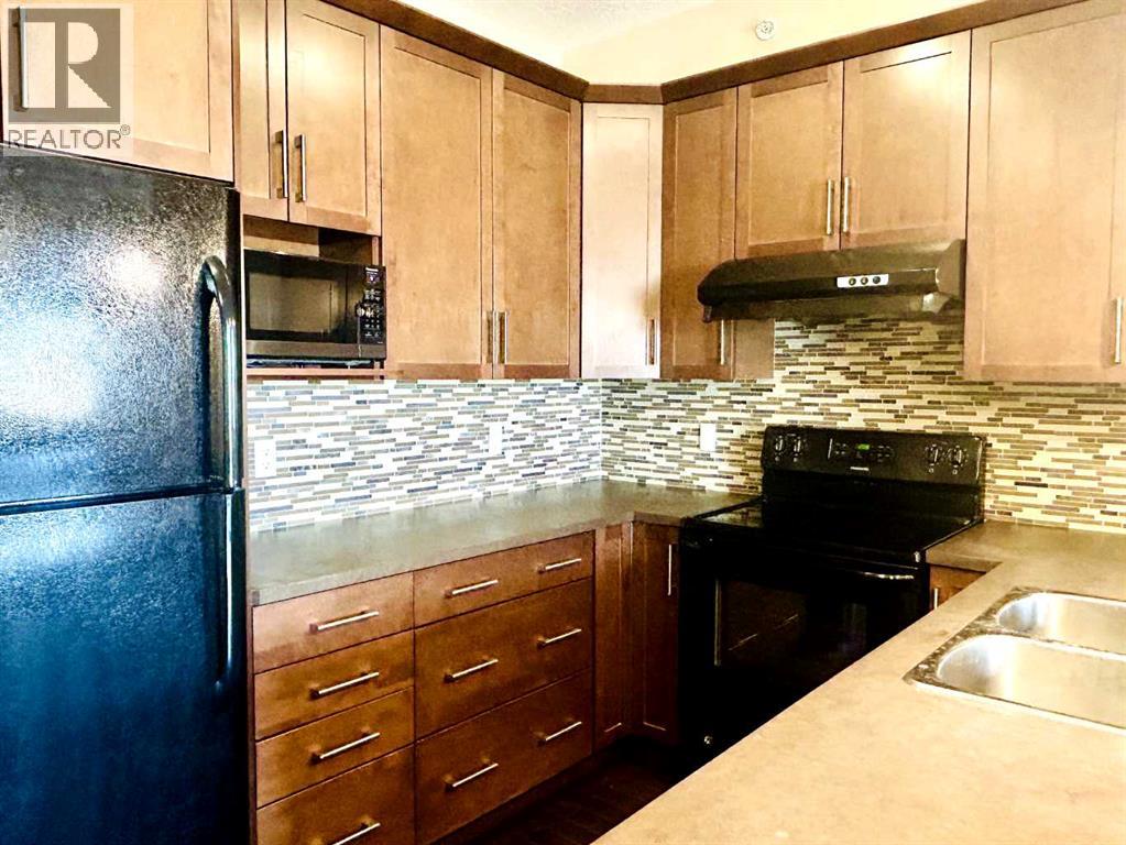 2418, 175 Panatella Hill Nw, Calgary, Alberta  T3K 0V9 - Photo 5 - A2284775