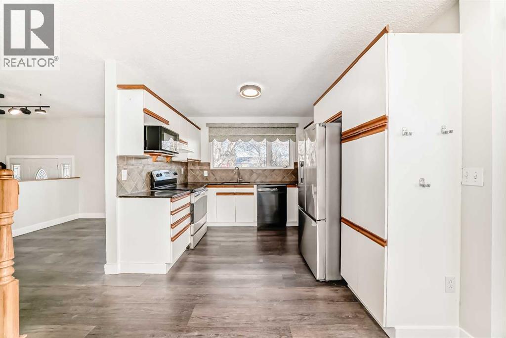 2831 63 Avenue Sw, Calgary, Alberta  T3E 5J6 - Photo 5 - A2280682