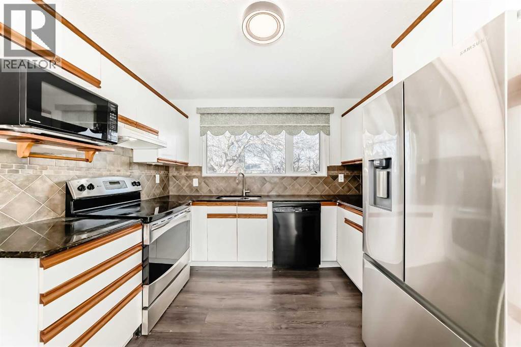 2831 63 Avenue Sw, Calgary, Alberta  T3E 5J6 - Photo 8 - A2280682