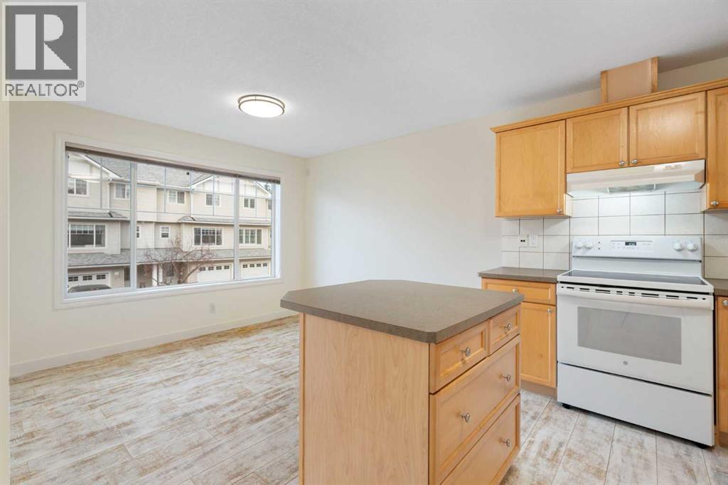 88 Crystal Shores Cove, Okotoks, Alberta  T1S 2B4 - Photo 9 - A2285787