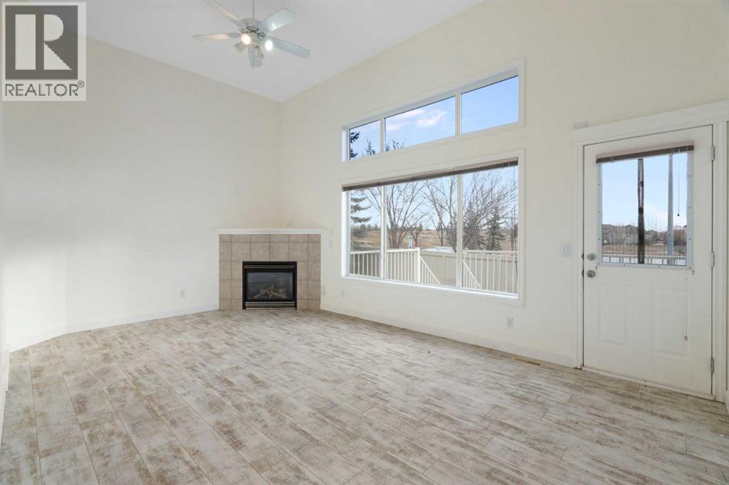 88 Crystal Shores Cove, Okotoks, Alberta  T1S 2B4 - Photo 5 - A2285787