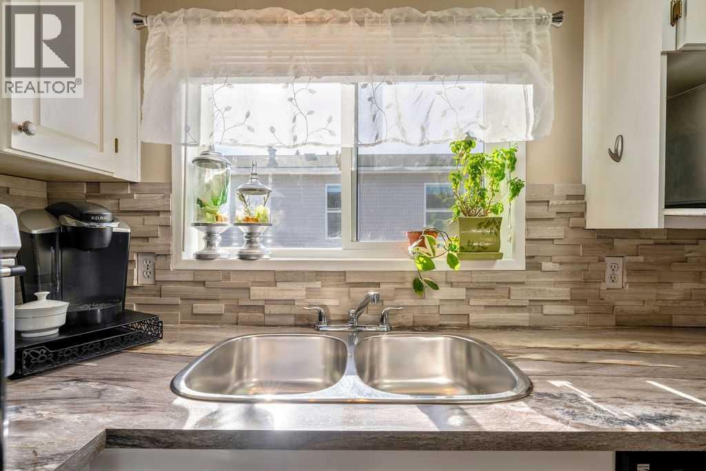 424 Heritage Crescent, Okotoks, Alberta  T1S 1P2 - Photo 9 - A2286106