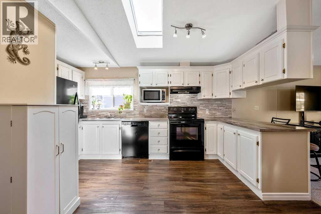 424 Heritage Crescent, Okotoks, Alberta  T1S 1P2 - Photo 7 - A2286106