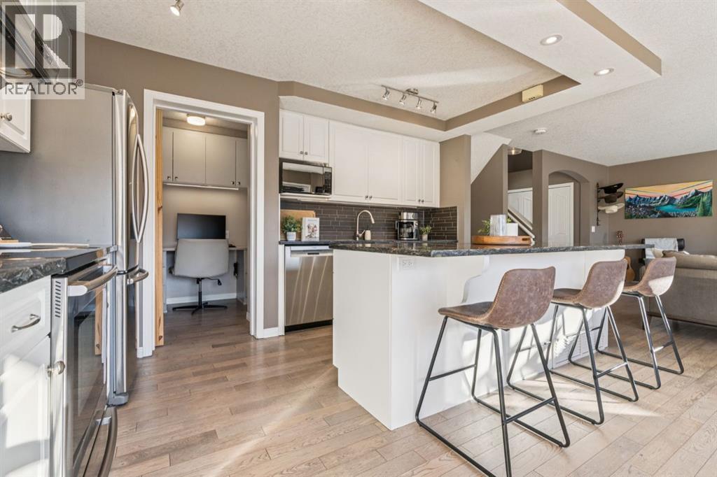 104 Bow Ridge Crescent, Cochrane, Alberta  T4C 1V2 - Photo 11 - A2285566