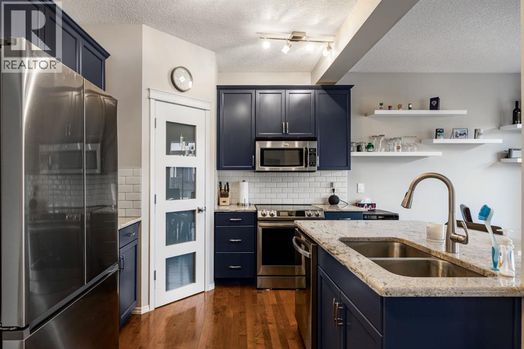 526 New Brighton Drive Se, Calgary, Alberta  T2Z 0N8 - Photo 4 - A2285484