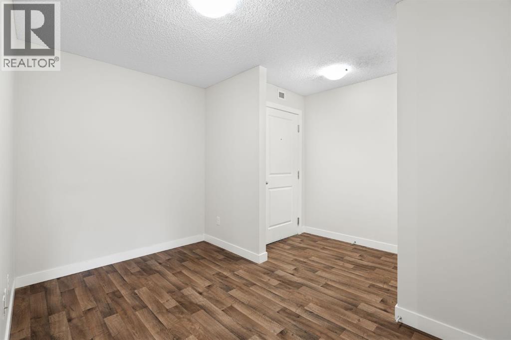 4220, 403 Mackenzie Way Sw, Airdrie, Alberta  T4B 3V7 - Photo 3 - A2281177