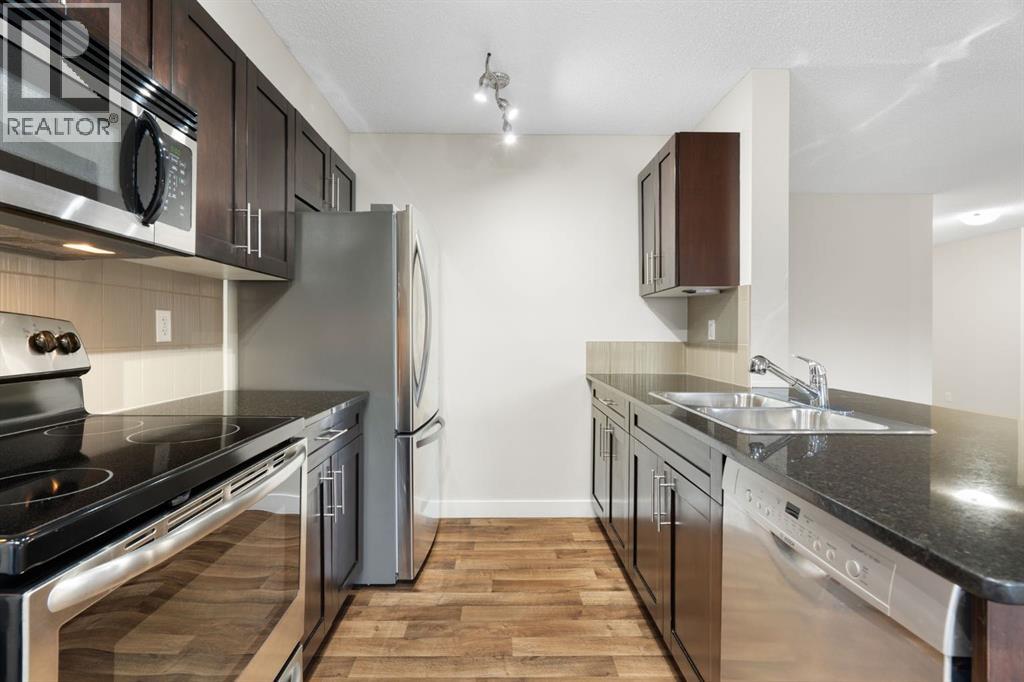 4220, 403 Mackenzie Way Sw, Airdrie, Alberta  T4B 3V7 - Photo 8 - A2281177