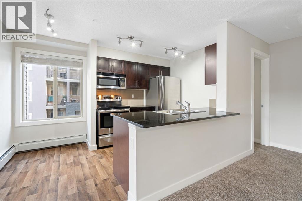 4220, 403 Mackenzie Way Sw, Airdrie, Alberta  T4B 3V7 - Photo 7 - A2281177