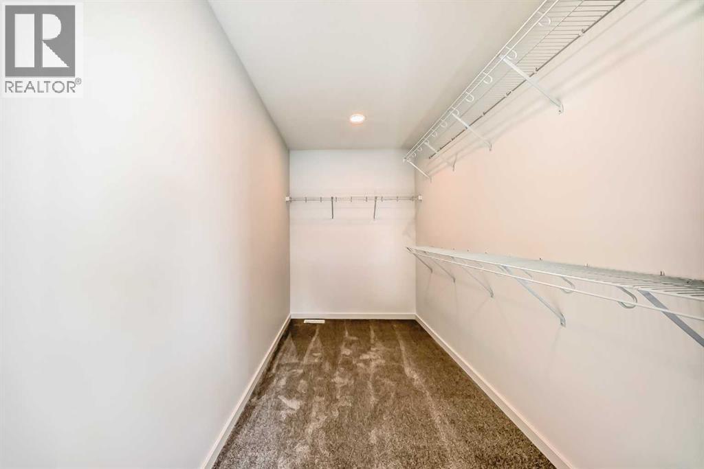 63 Creekside Path Sw, Calgary, Alberta  T2X 5V9 - Photo 23 - A2279480