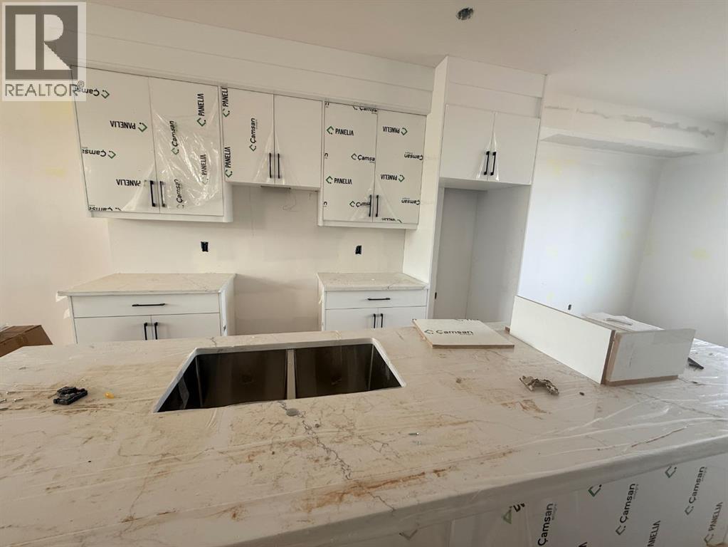 1927 1929 1931 Mccaskill Drive, Crossfield, Alberta  T0M 0C1 - Photo 17 - A2257619