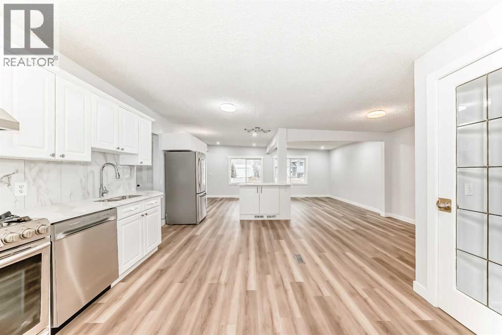 307 Huntridge Road Ne, Calgary, Alberta  T2K 4B8 - Photo 11 - A2272014