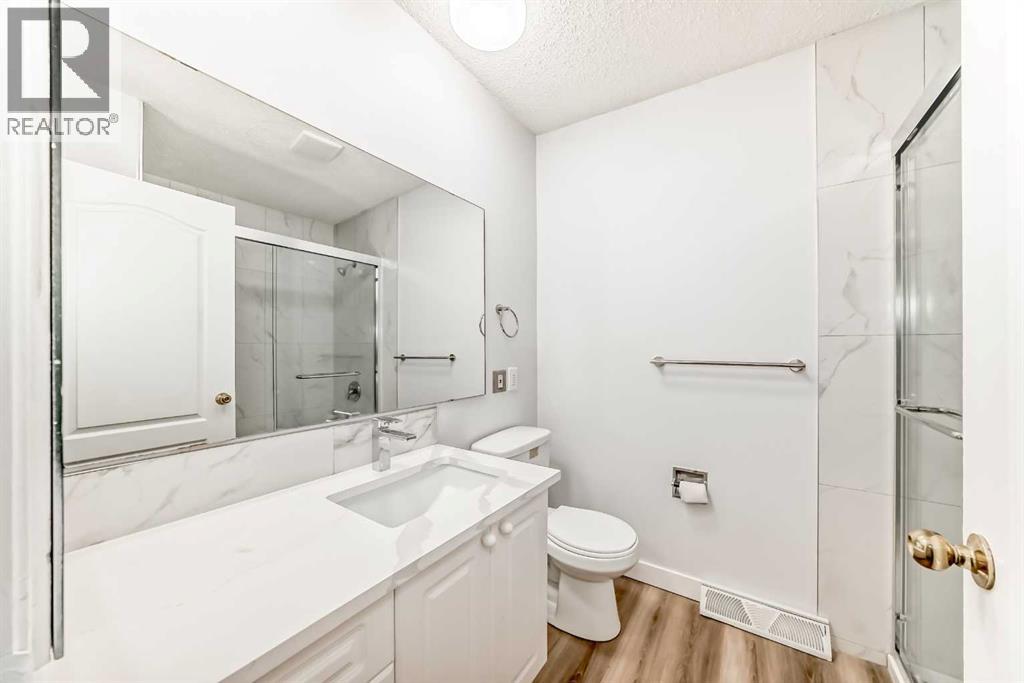 307 Huntridge Road Ne, Calgary, Alberta  T2K 4B8 - Photo 29 - A2272014
