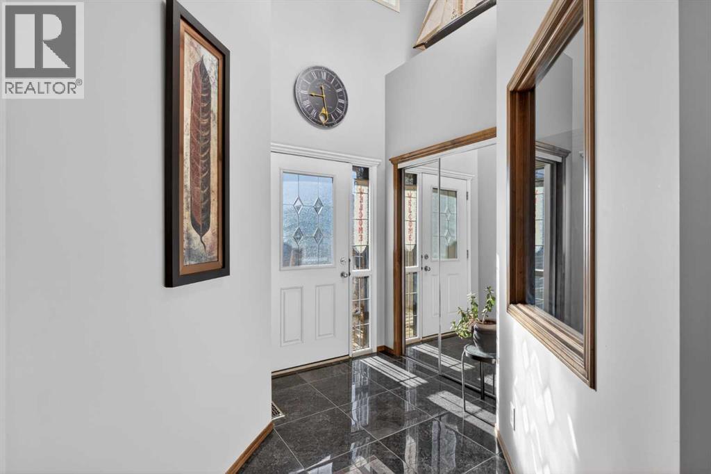 57 Pantego Hill Nw, Calgary, Alberta  T3K 0B7 - Photo 2 - A2284912