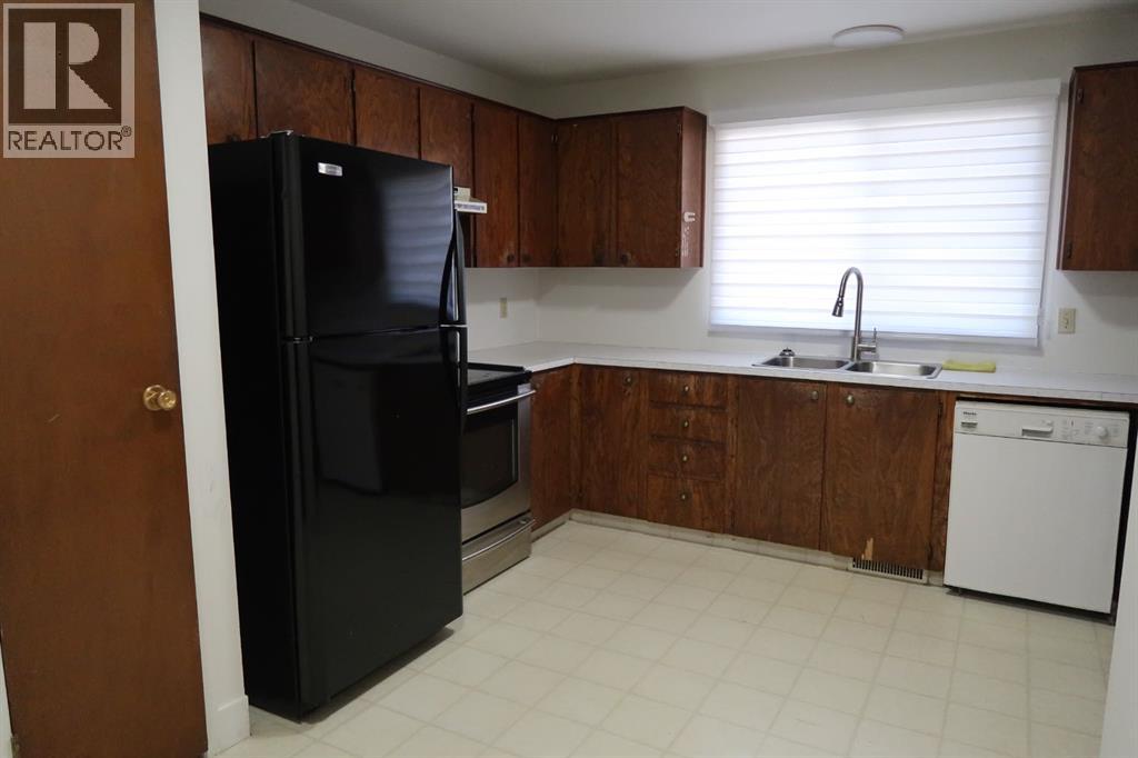 6807 Huntchester Road Ne, Calgary, Alberta  T2K 5E6 - Photo 5 - A2285264